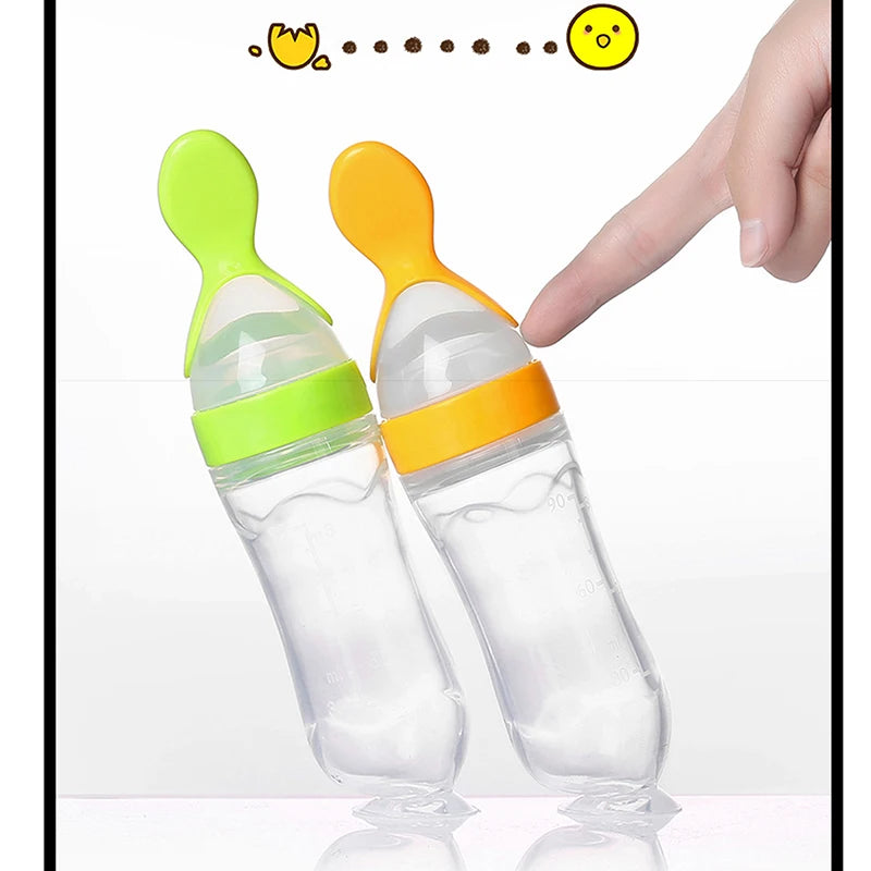 Silicone Squeezing Feeding Bottle: Baby Training Spoon